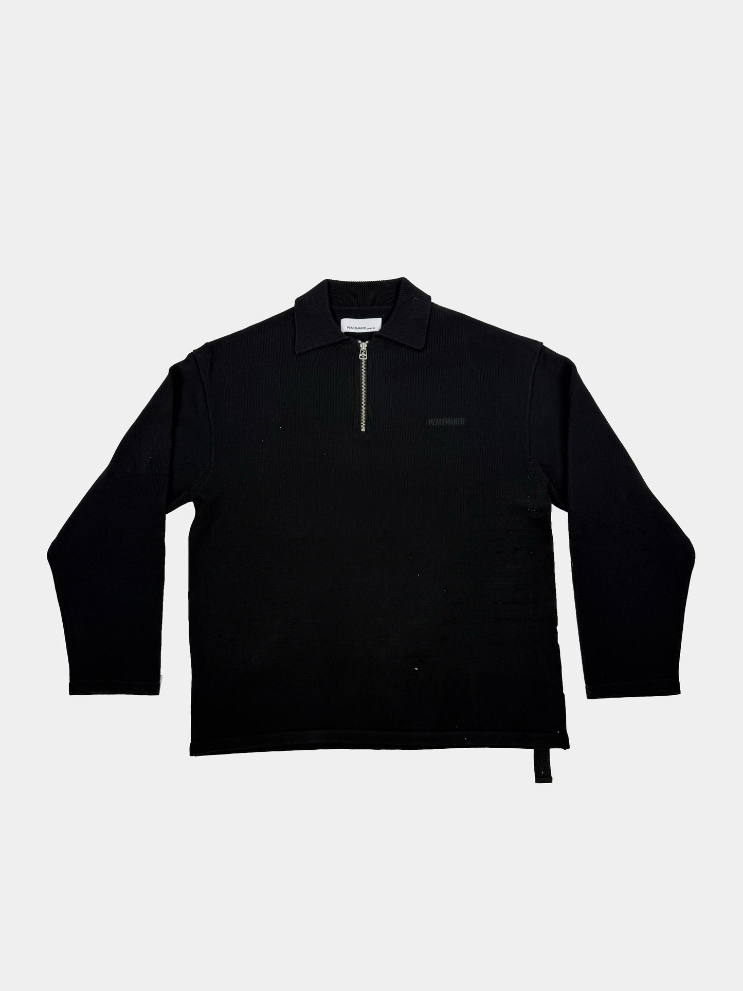 Polo con zip OAMC PEACEMAKER