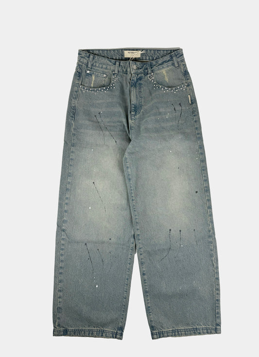 Jeans con borchie RETERNITY