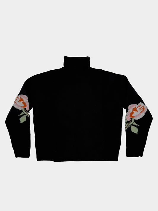 Pull collo alto con rose NANUSHKA